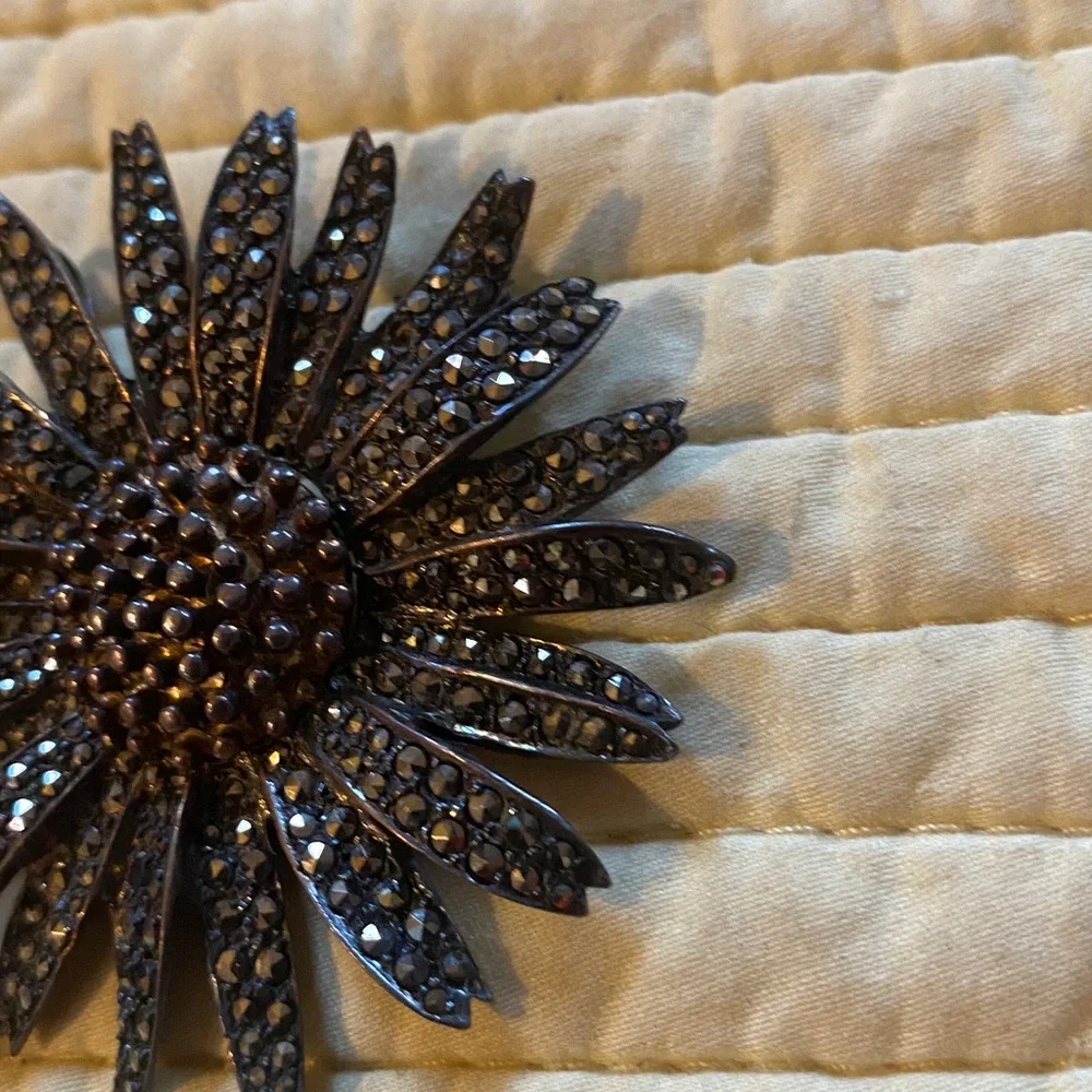 Antique sterling silver marcasite sunflower brooch.